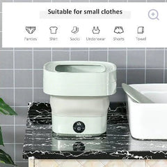 White laundry basket on a marble surface with small clothes icons above.