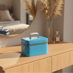 Blue cosmetic case on a wooden dresser with decorative elements